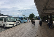 The hotel shuttle bus stop is right in front of you